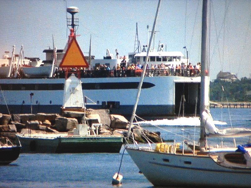 The ferry arrives at Amity Island in Jaws. Can you spot me?